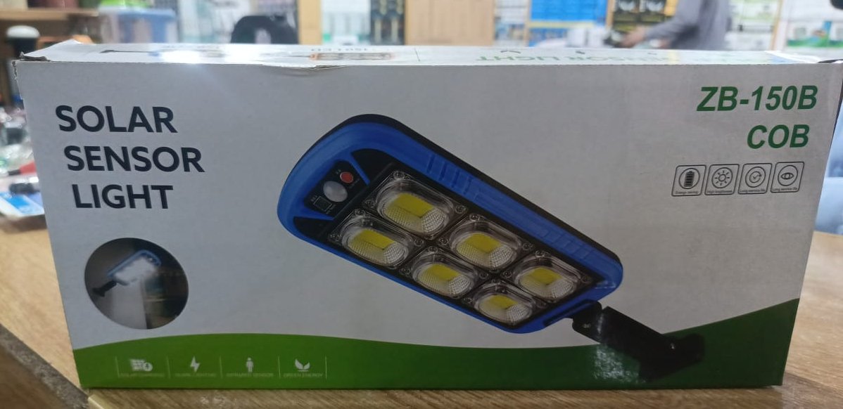 WhatsApp-Image-2024-10-30-at-3.45.32-PM.jpeg Solar Street COB Light With Sensor ZB-150B | Motion Sensor Security Streetlights for Parking Lot - Remote Control (Random color) - Image 1